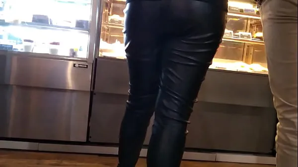 Big Brand new girl in sexy leather pants standing in line at the mall's food court clips Tube