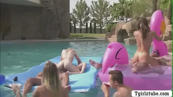 Big Busty shemales are in the swimming pool with many guys that,they decide to do orgy and they start kissing each is,they suck their big cocks passionately and they let them bareback their wet ass too clips Tube